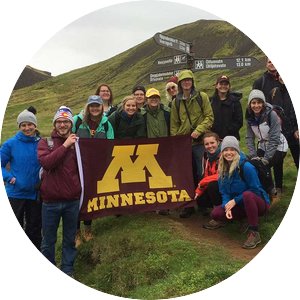 Group of students with a Minnesota flag in Iceland.