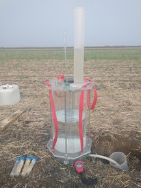 Water infiltration experiment set up, measuring water infiltration into soil via quantity of run off collected.
