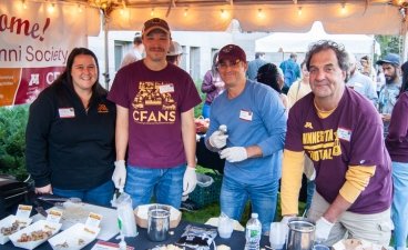 The CFANS Sampler, with four volunteers serving cheese and ice cream