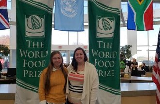 Lisa Orren at the world food prize with a student.