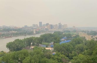 Buildings in downtown St. Paul are covered in haze