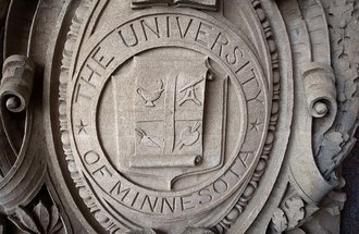 University of Minnesota seal carved in stone.