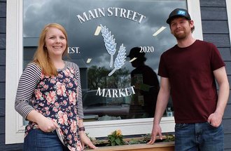 Caileen and Alex Ostenson operate Main Street Market in Evansville, Minn.