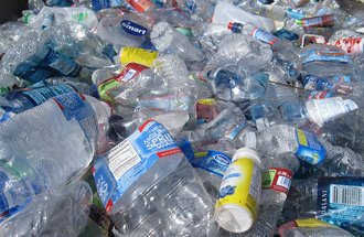 Empty plastic bottles in a pile.